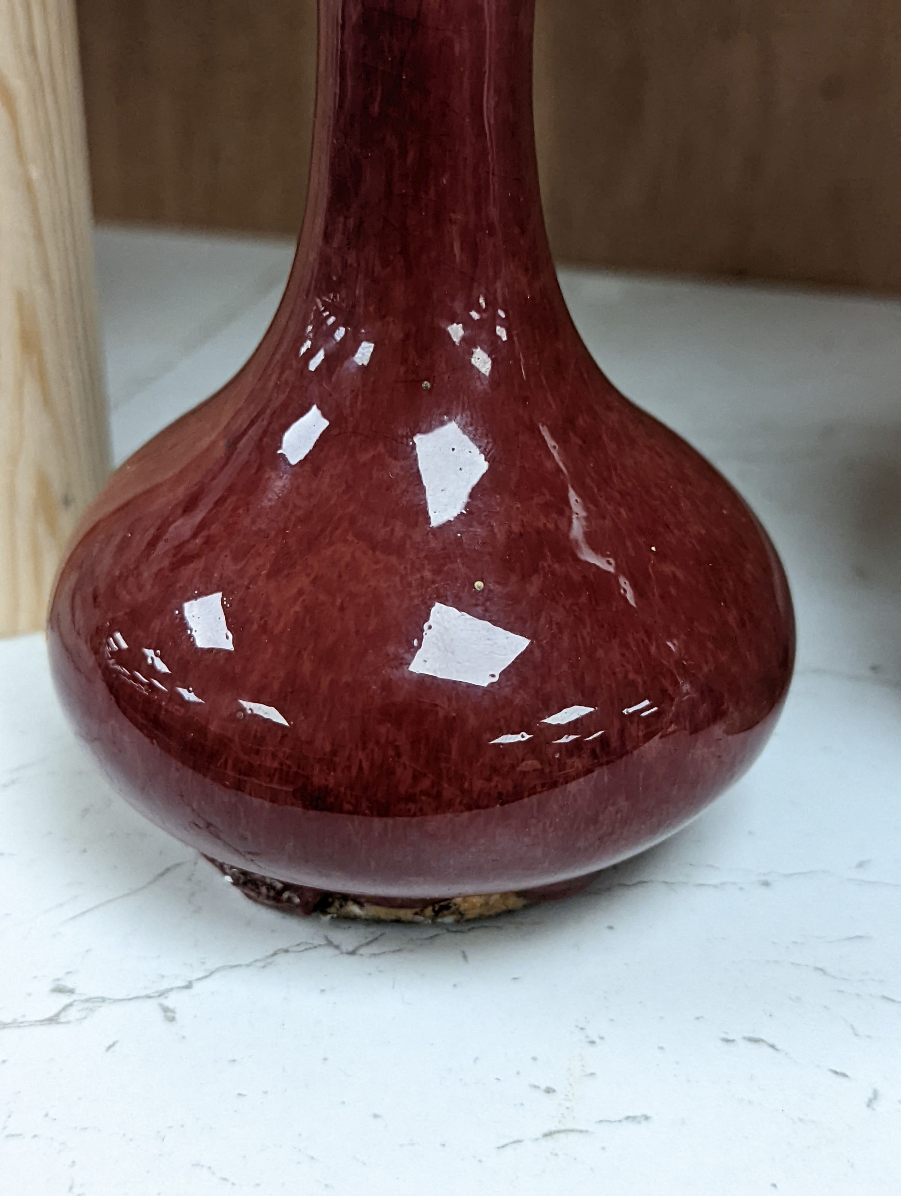 Three 19th Chinese monochrome glazed vases, with sang de boeuf, celadon and turquoise crackle glaze, tallest 21 cm